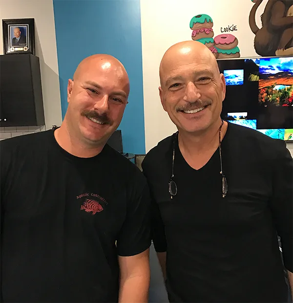 Aquarium expert Brian Hoover with client Howie Mandel